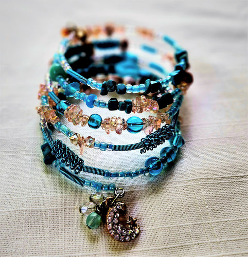 NM2-001 Bracelet Blue/ Creme with charms